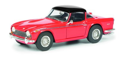 Triumph TR5 with closed surrey top, red